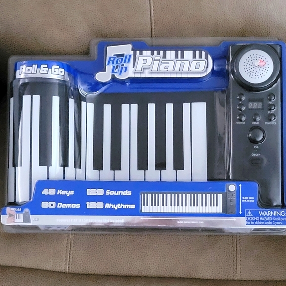 New Roll Up Piano Roll & Go - sealed package - Picture 1 of 4